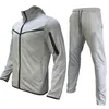 Tunna herr- och kvinnors sportkläder tekniska fleece -byxor jogga kläder sportkläder casual lös tryckt skalle dragskon sportkläder A26