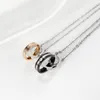 Colliers Personnalisé Double Anneau Ornement En Gros Classique Vente Chaude Titane Acier Couple Collier Ornements