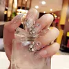 Faux ongles 24 pièces dames faux ongles Transparent perles florales décor bricolage mariée faux Sdecoration fournitures autocollants 220225