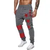 New Men Star Prints Pantalons de survêtement Hommes Pantalons de survêtement décontractés Striped Patchwork Joggers Pantalons Mode Hip Streetwear LJ201103