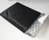 100 шт. 110 * 130 мм Матовый черный пузырьки конверты сумки почтовики мягкие доставки конверт с пузырькой рассылкой алюминиевая фольга сумки Y200709