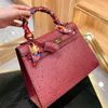 Women Handbag Genuine Leather Bags Shoulder Bag Fashion Plain Calf Leather Ostrich Skin Lock Key Hasp Artwork Hand B232u