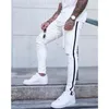 メンズ新しいリッピングジーンズファッショントレンドハイストリートストライプデミンペンシルパンツデザイナー春秋男性巾着カジュアルジーンズ