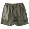 Metal nylon Shorts masculinos de secagem rápida Marca da moda Calças de praia de verão de alta qualidade Casual Capris