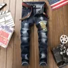 Europeus estilo homens esticar jeans fino bordado calças tigre flor calças de pé masculino casual streetwear roupa legal c1123