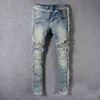 Jeans da uomo Pantaloni firmati da motociclista in difficoltà Pantaloni skinny slim strappati con lettera bucata Pantaloni in denim hip-hop di marca di alta qualità