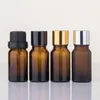 Boston Round Amber Glass Cosmetic Essential Oil Bottle with Plug & Screw Lid 5ml 10ml 15ml 20ml 30ml 50ml 100ml Small Glass Oud Oil Bottle Wholesale