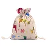 10 * 14cmchristmas Drawstring Bags Bomull Linen Småpåse Tygdukar Mode Mönster Jute Sack Kids Candy Gifts Storage Bag Protbara plånböcker