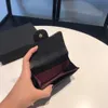 뜨거운 최고의 품질의 정품 가죽 망 지갑 상자가있는 Luxurys 디자이너 지갑 Womens Wallet Prese Credit Card 홀더 여권 홀더 857857