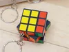 nyckelring Mind game Rubik's Cube nyckelring Favor pojkar flickor tredje ordningens hänge vuxen barn Nyckelringar partihandel