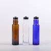 Hoogwaardige drop-proof glazen rolflessen Essentiële olie Lichaamolie Amber Clear Blauw Natuurlijk Dikke Glazen lip Tint Roller flessen met metalen roestvrijstalen bal Groothandel