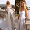 Superbe une ligne perles robes de mariée bretelles spaghetti surjupe robes de mariée avant fendu balayage train robe de mariée