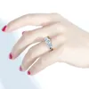 Transgems 10K 화이트 골드 2.2ctw 센터 1.2ct 7mm 및 측면 0.5ct 5mm F 색 Moissanite 3 돌 약혼 기념일 반지 Y200620