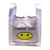 24 * 40 cm wysokiej jakości torby HDPE supermarket żółty uroczy uśmiech biała kamizelka plastikowa przewoźnik zakupy torba na zakupy