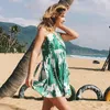 Ny design sommar kvinna söta kläder med rackless damer casual sun blommig tryckt klänning kvinna v-hals strand klänning