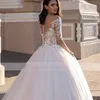 2022 Scoop cou manches longues une ligne robe de mariée pour la mariée appliques dentelle perles perlées printemps été robes de mariée dos ouvert illusion mariée tulle robes formelles