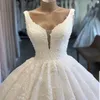 Wspaniałe koronkowe sukienki ślubne Skupa koronkowe aplikacje cekiny szatę de mariee z tył długi pociąg