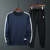 Sportsuit Männer setzt Herbst Winter Winter Langarm Hoodies Fitness Tracksuit Herren Casual Hosen Marke Kleidung Patchwork Marke Set männlich 201128