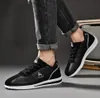 Fashion Men's Jogging Shoes Flats Comfortable antiscivolo Low Lace-up Casual Sneakers Scarpe da ginnastica Allenatori Esterno Autostimenti Abbigliamento Maschile Zapatos Scarpa sportiva 39-44