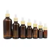 False Wood Plastic Lid Empty Brown Glass Filling Bottle Cosmetic Packaging Containers Essential Oil Rubber Dropper Vials 5ml 10ml 15ml 20ml 30ml 50ml 100ml