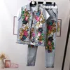 ヨーロッパスタイルのデニムスーツファッション衣装女性新しい花スパンコールデニムジャケットショートジャケットジーンズパンツ 2 点セット女性 LJ201117