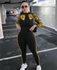 Herbst Winter Frauen einfarbige Overalls Designer dünne Langarm-Bodys trendige Leoparden-Strampler lässige schwarze Overalls Leggings 4183