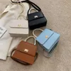 حقائب حمل البسيطة بو الجلود حقائب الكتف crossbody للنساء 2021 سلسلة تصميم حقيبة يد الفاخرة الإناث السفر مع مقبض اللؤلؤ