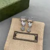 Glänsande Pearl Crystal Charm Örhängen Ladies Färgade Hängsmycke Eardrops Studs Präglade Stämpel Diamond Lion Head Dangler med presentförpackning
