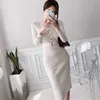 Winter stricken einreihige Han-Ausgabe OL Temperament kultivieren die Moral Mode Tasche Hüfte Pullover Kleid 210602