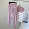 Pantalones de dos piezas para mujer Primavera Verano Rayas de manga corta de punto Coreano 2 Set Mujeres Patchwork O Cuello Tops y pantalón Trajes Pink Casual Track