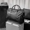 Högsta kvalitet män mode duffle resväskor kvinnorhandle bagage gentleman affärs totes med axelrem beröm handväska