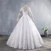 ZJ9160 2021 Dubai Elegante maniche lunghe Ball Gown Abiti da sposa Sheer girocollo in pizzo Appliques in rilievo Vestios De Novia nuziale