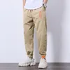メンズパンツ2021メンズハーレムファッション服バギーヒップホップジョガーズ韓国風の革師のズボン男性のテクニカウェアのための男性の貨物