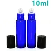 10 ml blå färgglasflaskor med rostfritt stål rullar och svart lock för E flytande oljely parfym Billiga grossistfri DHL frakt