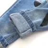 Casual vår höst 2 10 år 90 140cm Snyggt barn färg patchwork Pocket Elastic Cartoon Loose Denim Jeans för pojke 210701