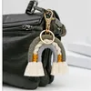 مفاتيح مفاتيح Boho Rainbow Tassel Woven keychain Carking Holder Bag Wallet Decor