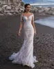 Sexiga Scoop Långärmade Sjöfrökta Bröllopsklänningar Abito da Sposa Sweep Train Lace Bridal Gown Champagne och Elfenbenstrand Boho Bröllopsklänning