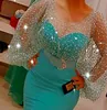 2022 Plus Size Arabisch Aso Ebi Meerjungfrau Sexy glitzernde Ballkleider mit langen Ärmeln, transparentem Hals, formelle Party, zweiter Empfang, Brautjungfernkleid