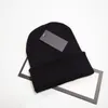 10 pcs Primavera outono homem inverno chapéus de Natal para mulher esporte moda feijões de feijões Chapas de algodão gorros gorros lã quente chapéu de malha boné de malha 4 cores de esqui cor pura