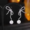 SINZRY mode bijoux fantaisie coréen élégant cubique zircon nœud papillon perle vintage boucles d'oreilles pour les femmes