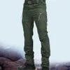 メンズ戦術パンツ複数のポケットの弾力性の軍用都市タチットカールズボン男性スリム脂肪貨物パンツ5xL 210616