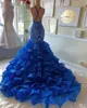 Sexy Backless Royal Blue Mermaid Prom Dresses 2021 Tiered Skirt Back Criss Cross Long Formal Evening Gowns Appliqued Sequins Sparkly Shiny Engagement Dress