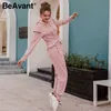 Beavant Eleganckie Solidne damskie Kombinezony Wzburzyć Rękaw Kapturem Kołnierz Jesień Zima Kombinezon Romper Streetwear Ladies Pocket Overal 210709