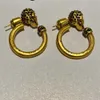 Märke mode smycken guld färg skalle huvudörhängen kristall tofs örhängen vintage hoop design mode party örhängen9170786