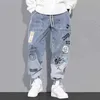 メンズパンツ秋落書きアンクルバンドジーンズ韓国風緩いカジュアルハーレム男性日本のファッションストリートウェアズボン