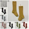 Calcetines de bebé Niñas Hasta la rodilla Calcetines largos Calcetines de rayas de algodón suave Niños recién nacidos Medias casuales sólidas 16 colores