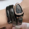 2021 Reloj Mujer Роскошные золотые часы со змеиным подзаводом Женская мода Кристалл Кварцевый браслет Браслет Часы Женские часы Подарки H1012