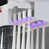 Manyetik Adsorpsiyon Diş Fırçası Tutucu Otomatik Diş Macunu Sıkacağı Ev Depolama Rafları Duvara Monte Banyo Aksesuarları Setleri 210904