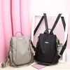 Ryggsäck Style 2021 Kvinnors Casual Nylon Solid Color School Bag Fashion Avtagbar Axelrem