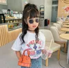 Barn handväskor mode koreanska små tjejer mini prinsessa myntpåsar underbara cross-body skalpåsar barn godis handväska gåvor